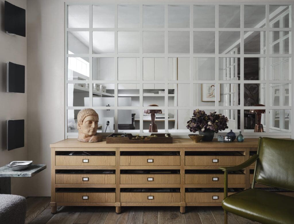 The studio features a custom cabinet  designed by Doniphan Moore. Clay bust from Coup d'Etat. (Photo by Douglas Friedman)