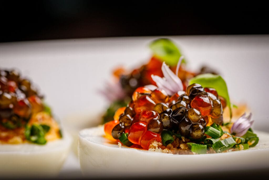 One of The Mont’s elevated small plate offerings is the deviled eggs, topped with smoked roe.  (Photo by Samantha Marie Photography)