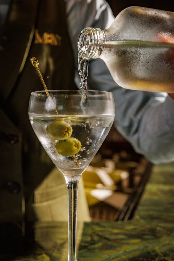 The Mont’s Freezer Martini, made with Nolet’s Gin and served ice-cold with olives, promises to be the perfect libation to start off a memorable dinner.   (Photo by Samantha Marie Photography)