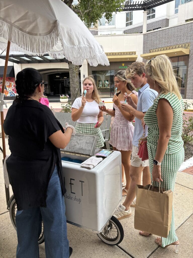 Guests enjoy scoops from Luliet Creamery & Bake Shop’s ice cream cart outside the Jo Malone Boutique at Market Street. (Photo by Laura Landsbaum)