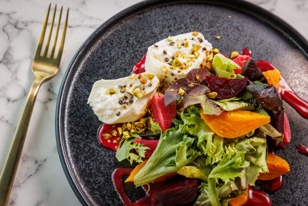 Highlights on the Elaine's menu include roasted baby beets burrata, pressed sandwiches, and more. (Photo by Samantha Marie Photography)