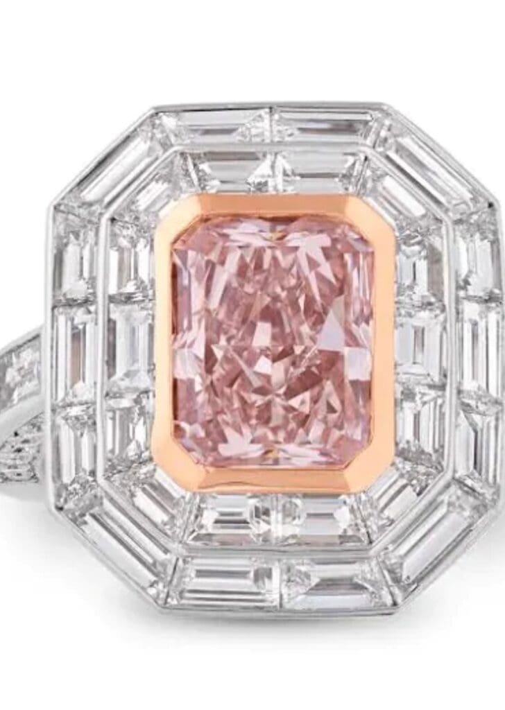 Kendra Scott's engagement ring from Zac Brown, 3.06 carat fancy pink diamond surrounded by 28 baguette cut brilliant white diamonds weighing a total of 3.17 carats set in platinum gold. A Valobra Master Jewelers custom creation.