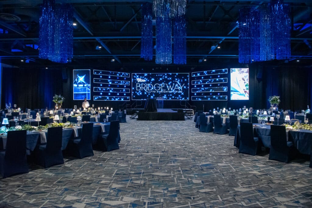 The ballroom at The Woodlands Waterway Marriott set for YES to YOUTH’s Bridgeway to a Brighter Future gala.