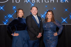 Yes to Youth event chairs Amber Scheer, Evan Berlin and Shannon Regan