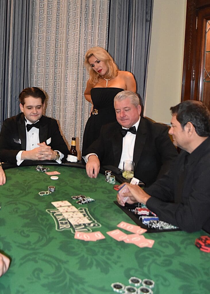 Garrett Sampson with Amy and Jim Lee (Photo by Deborah Brown)