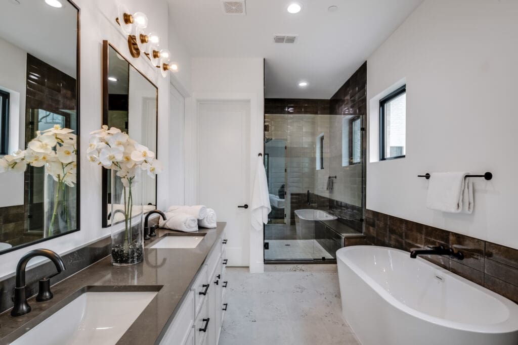 Spacious bathrooms and a free-standing bathtub at The Residences at Routh (Courtesy)