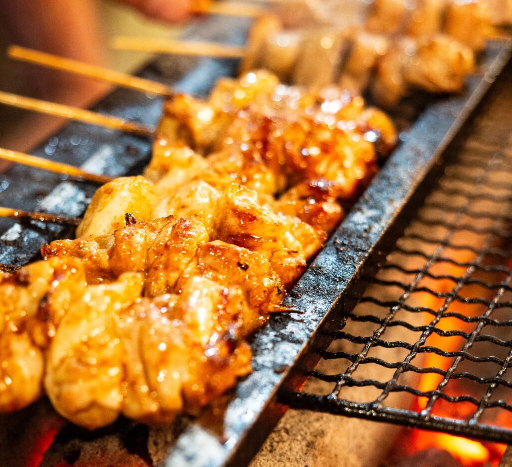 Yakitori chicken skewers at Ichiro Izakaya Yakitori Diner and Bar, grilled over charcoal for a smoky, tender bite. (Courtesy)