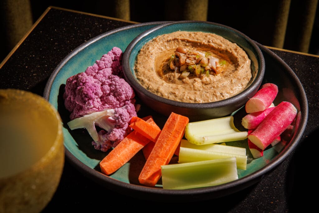 At Caché, the hummus is made with black-eyed peas, tahini, field peas, and pepper relish. (Photo by Samantha Marie Photography)