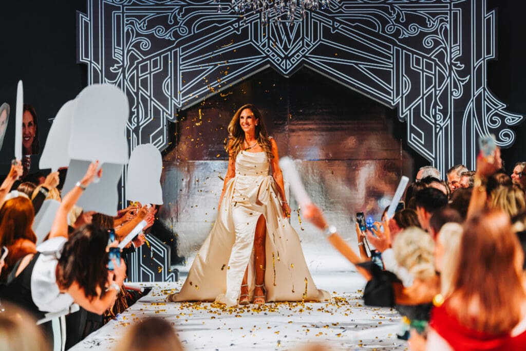 Community Champion Alison Henderson walked the runway at Interfaith's The Walk gala. (Photo by Interfaith of The Woodlands)