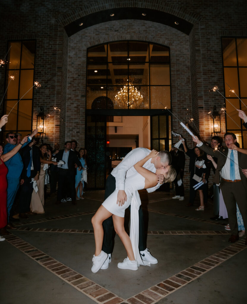Macey and JT changed into more casual attire with sneakers during the reception. (Photo by Emma Cate McNew Photography)