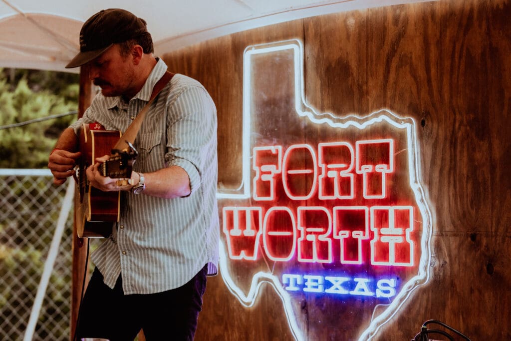 Local singer-songwriters like Grady Spencer champion their home city wherever they go. (Courtesy)