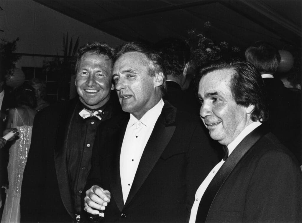 Robert Rauschenberg, Dennis Hopper, and Dickie Landry at the June 3, 1987, Menil Collection Inaugural Dinner. (Photo
by Crossley & Pogue.)