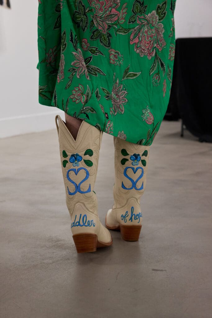The Duchess received Tecovas cowboy boots custom-painted by Grace Woodall (Photo by Adam Stewart)