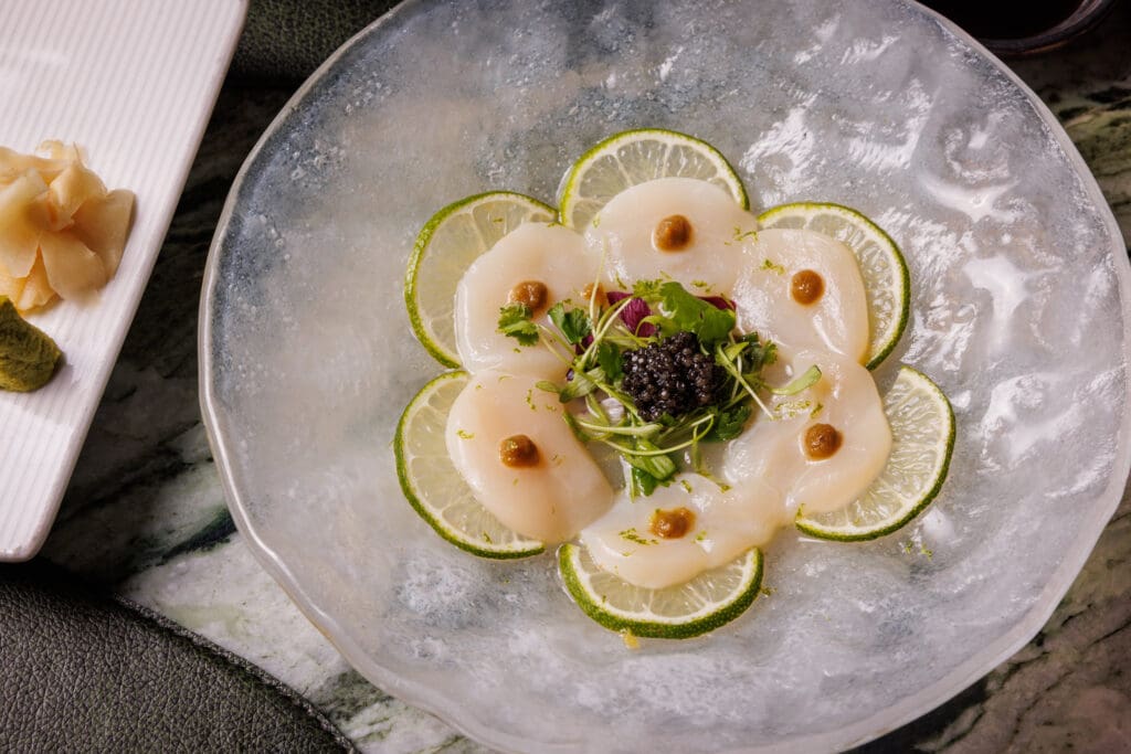 We especially loved the Hokkaido Scallop crudo at Crown Block. (Photo by Samantha Marie Photography)