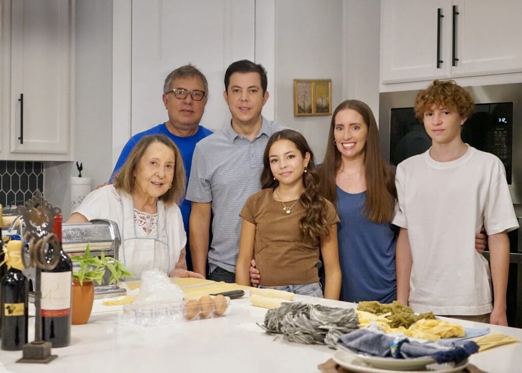Nonna Elda with her son Carlos (left) and grandson Enrique with his wife Lauren and their two children, Sofia and Preston.  (Photo by Sherri Segari)
