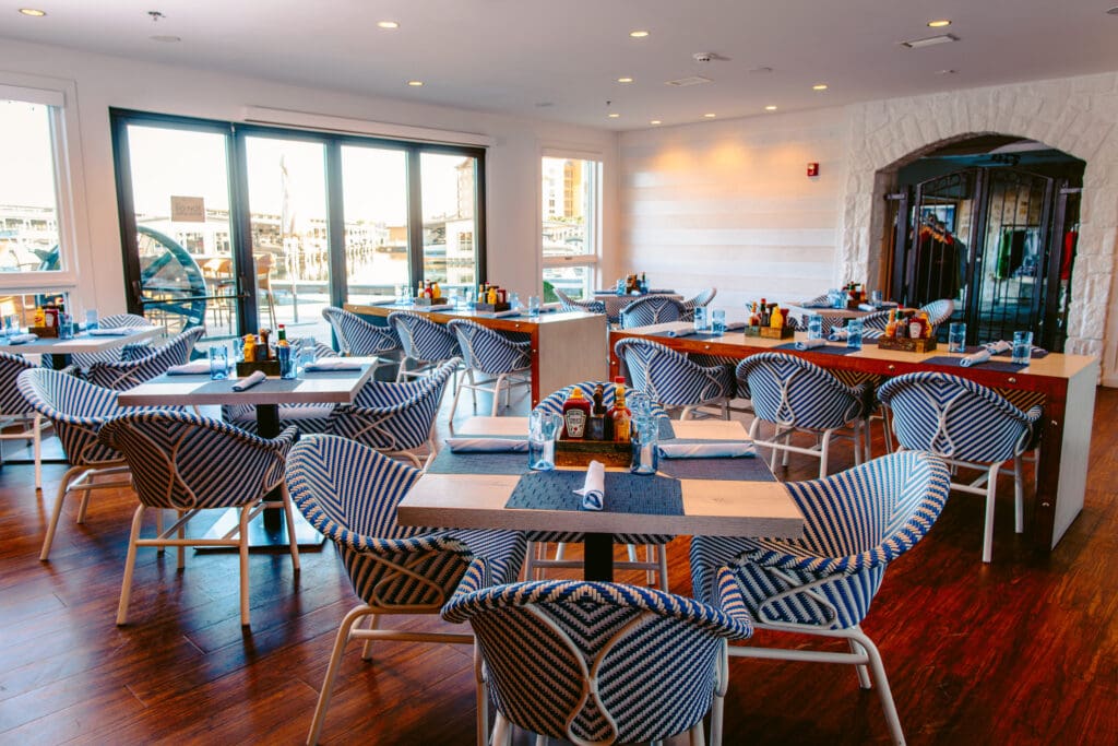 Waterfront Bar & Grill is a scenic, chicly-furnished space overlooking the lake. (Photo by Horseshoe Bay Resort)