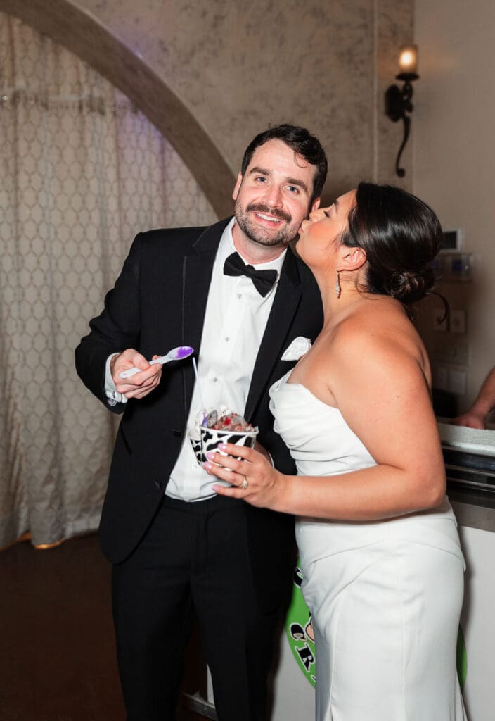 An ice cream cart with four custom flavors was one of Alexis Cantu and Aaron Campbell's favorite personal touches for their wedding. (Photo by Martin Hernandez Photography)