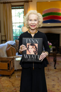 Lynn Wyatt with her book (Photo by Jenny Antill)