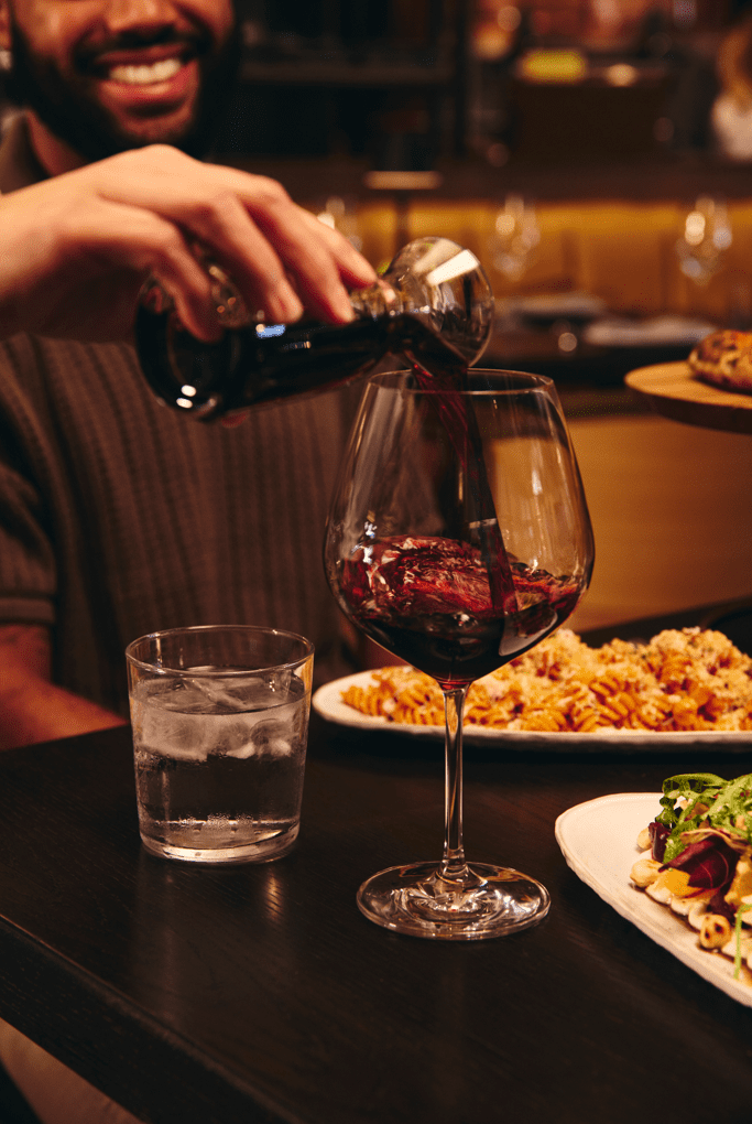 Red wine was poured during a Farena dinner event, part of the restaurant’s growing series of wine and spirits pairings that bring guests closer to the culinary vision of Chef Tony France. (Courtesy Farena)