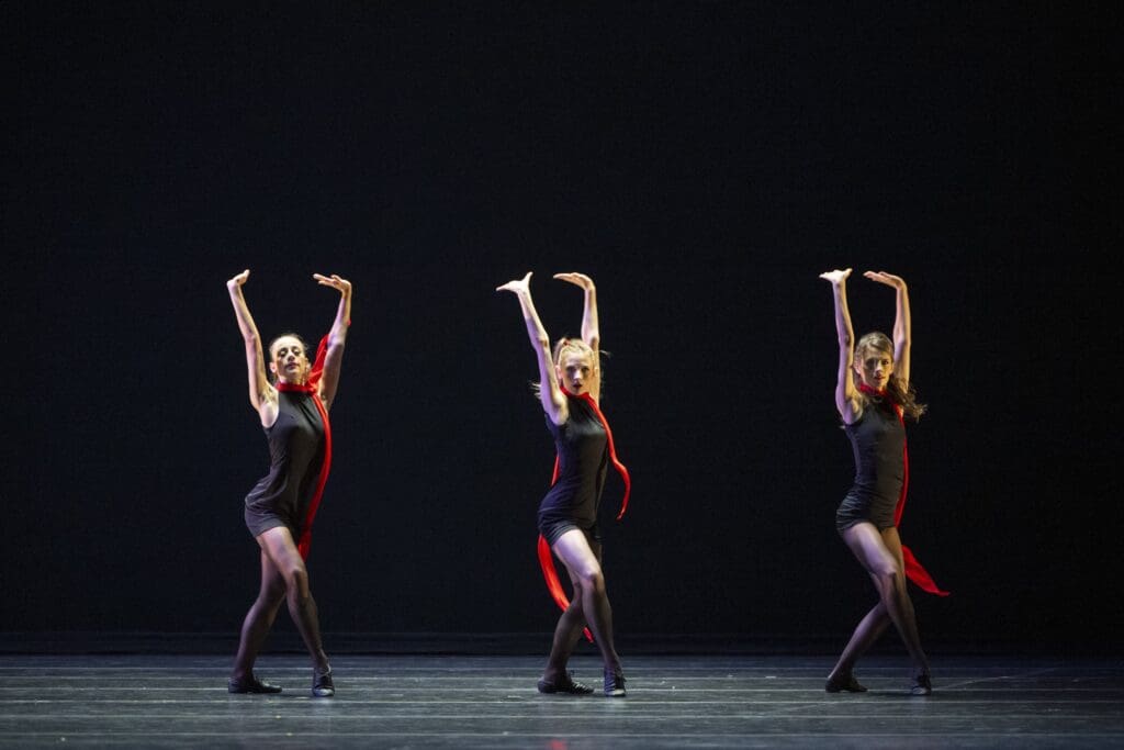 Houston Ballet First Soloist Tyler Donatelli, Corps de Ballet dancer Zoe Lucich and Soloist Jacquelyn Long in Christopher Bruce’s "Rooster" (Photo by Alana Campbell. Courtesy Houston Ballet.)