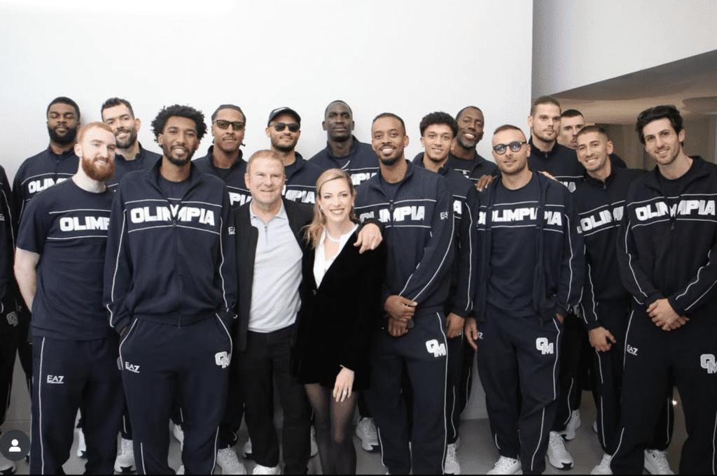 U.S. Ambassador Tilman Fertitta and wife Lauren Fertitta visit with Emporio Armani’s Olimpia Milano basketball team during Milan fashion week. (Photo by Instagram)