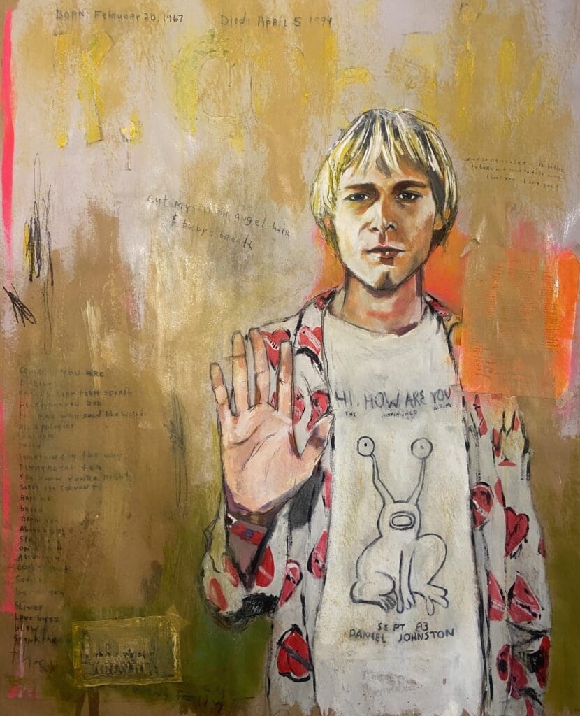 In "Last Words," Tra Slaughter’s portrait of Kurt Cobain shows him with hand raised and gaze steady, holding space for a legend gone too early. (Photo courtesy Tra Slaughter)