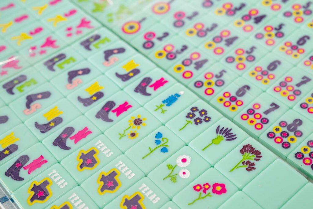 The Charleston Club offers a curated retail selection, including an assortment of cheerful (& cheeky!) mahjong tiles. (Photo by Bruno, Snap The Picture )