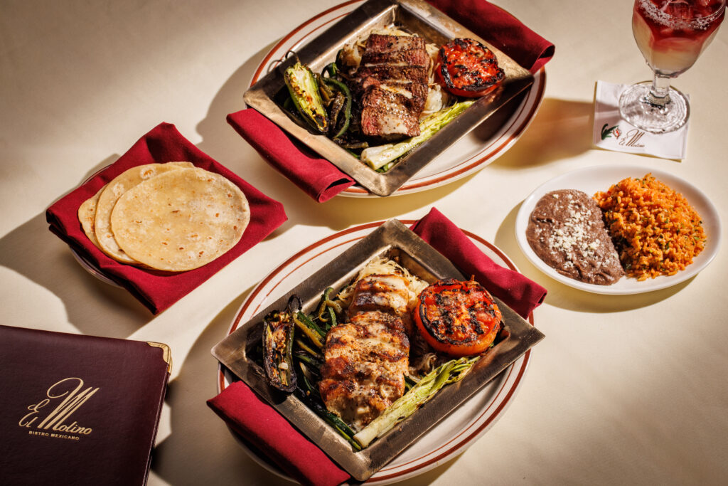 Wood-fired fajitas are a highlight of El Molino's menu and include filet mignon, fried chicken tenderitos, and more. (Photo by Samantha Marie Photography)