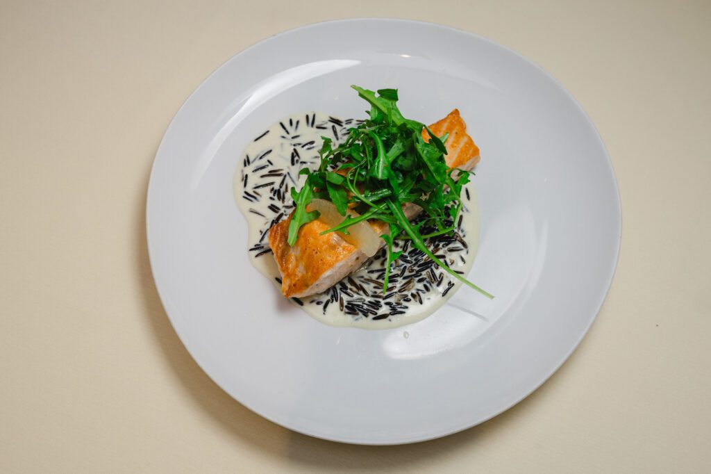Grilled salmon with arugula and lemon served with creamy blue cheese wild rice  served at the BCN luncheon (Photo by Johnny Than)