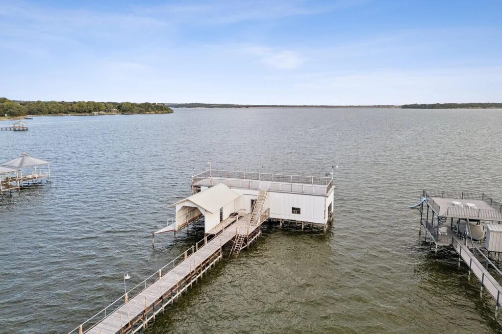 The castle-inspired estate at 9888 Boat Club Road comes with a private boat dock. (Courtesy)
