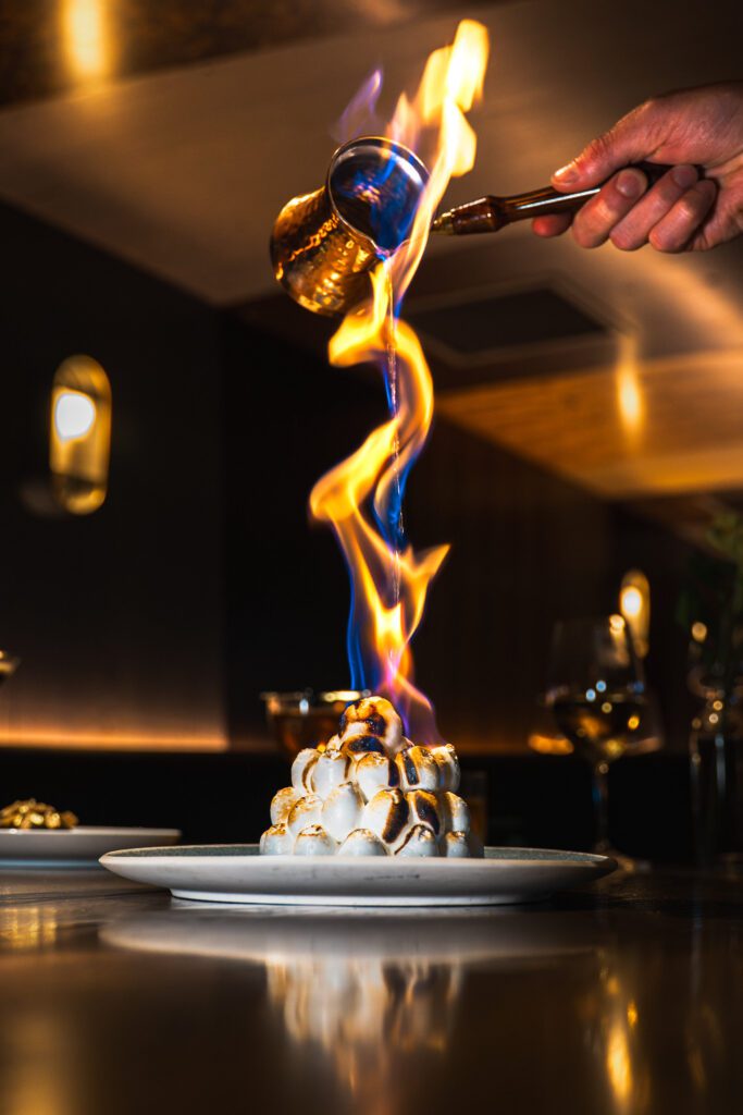 For dessert, guests can expect the Baked Dallas — a whisky cake topped with butter pecan ice cream. (Photo by Darah Hubbard Photography)