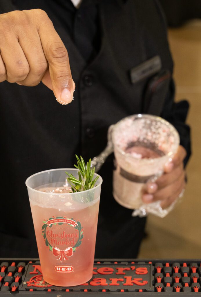 Guests enjoyed festive signature cocktails while they shopped. (Photo by George Fiala)