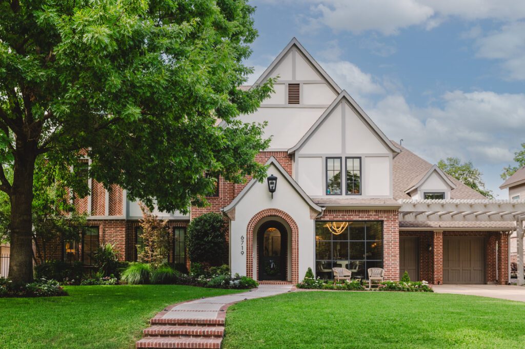 6719 Bob O Link Drive is a two-story home featuring open-concept living spaces indoors and outdoors.