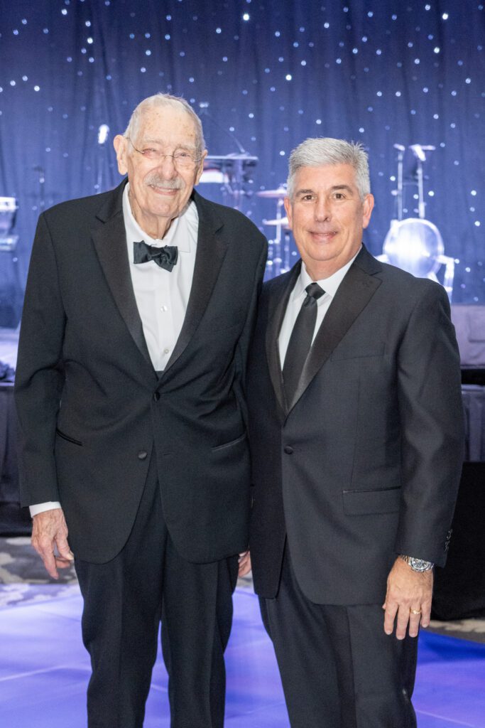 Dr. Walt Menninger, Armando Colombo at the Menninger Clinic Centennial Celebration. (Photo by Jacob Power)