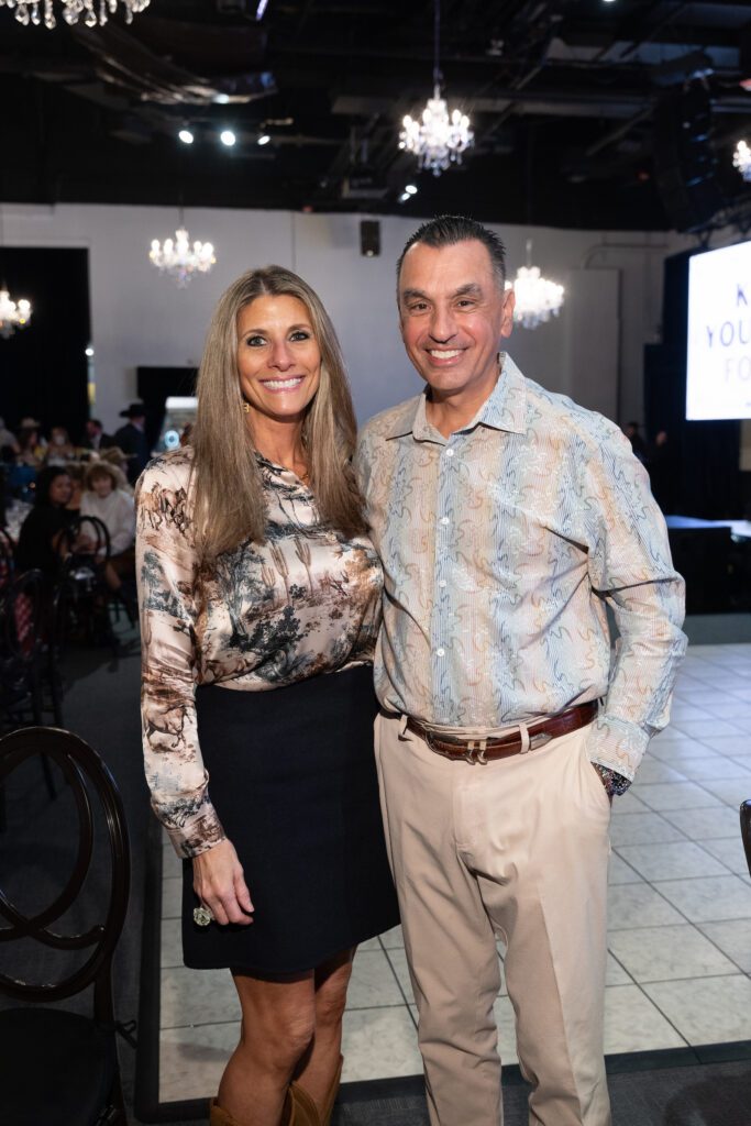 Gina & Dr. Devinder Bhatia at the Dec My Room 'Kick Up Your Boots for Kids' fundraiser  (Photo by Daniel Ortiz)