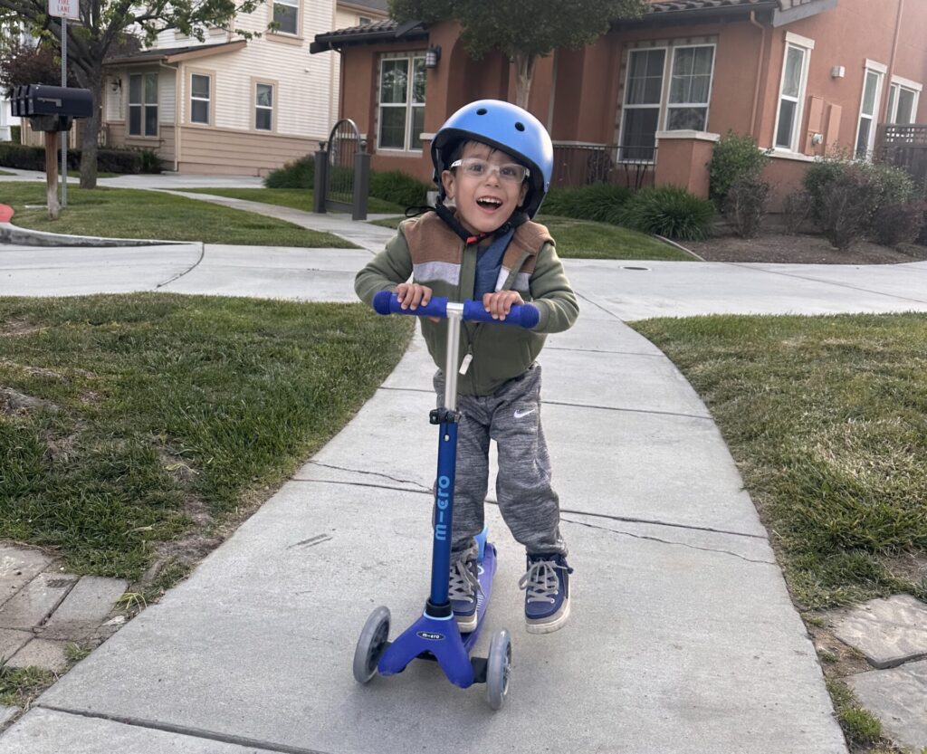 Back home in California, Zayn, now four, attends preschool, walks with more balance, and recently learned to ride a scooter.
