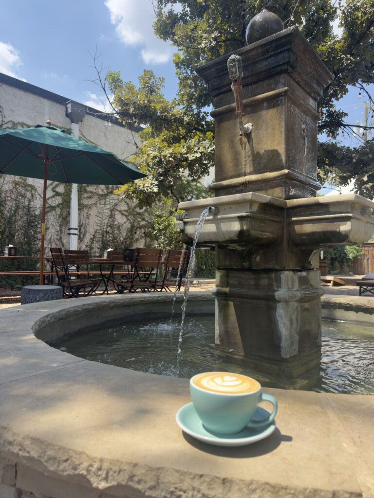 Sit inside or out on the patio by the fountain. (Courtesy Branch & Bean Coffee and Roastery)