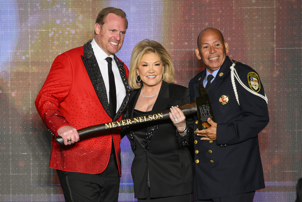 Marty Lancton, Edna Meyer-Nelson,Carlos Pascualli at the Houston Fire Fighters 'Red Hot Gala' (Photo by Catch Light Group)