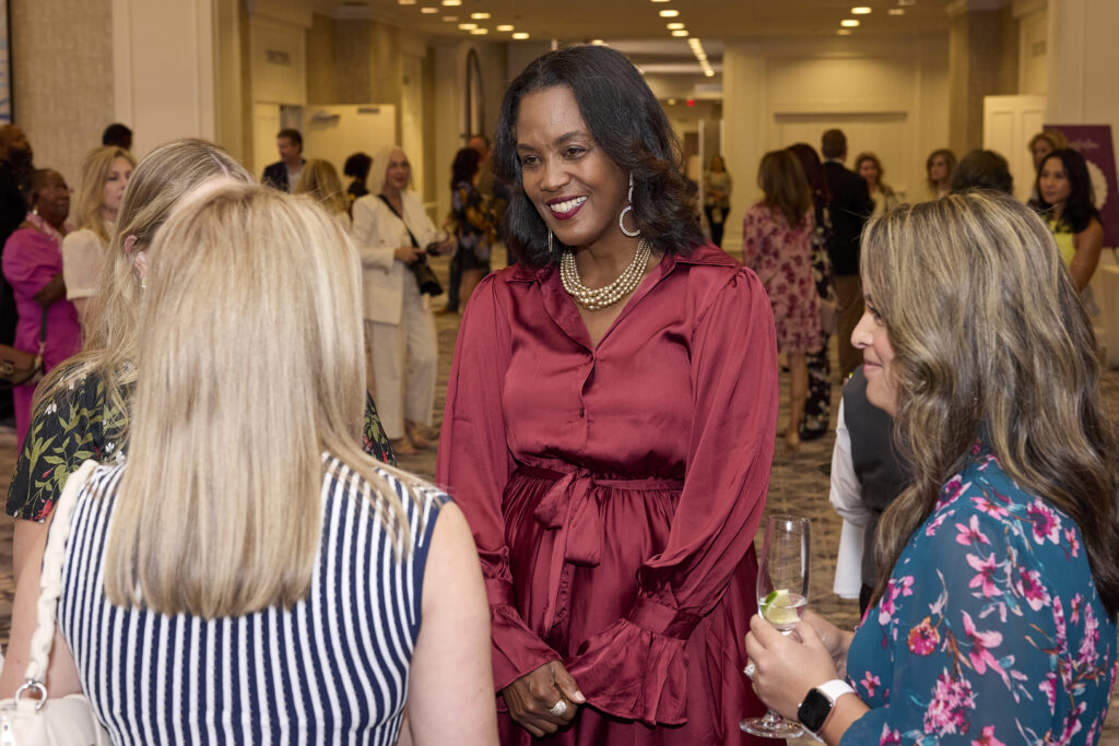 Tiffany Tate mingles with guests (Photo by Tamytha Cameron)