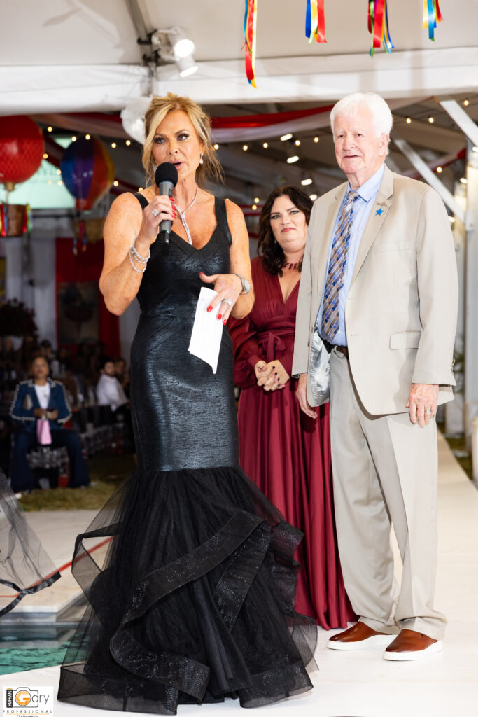 Theresa Roemer with Make-A-Wish's co-founder Tommy Austin and Shelly Millwee. (Photo courtesy of Gary Hufham)