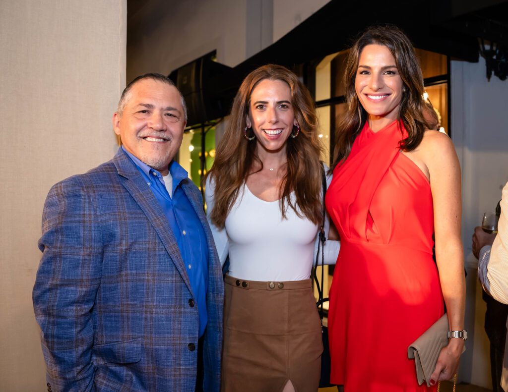 Bruce Padilla, Ashley Shafik, Sara Ritenour at the Elizabeth Anthony 'Go Red for Women' fashion event (Photo by (Photography by Christina Griffin, WDR Imagery))