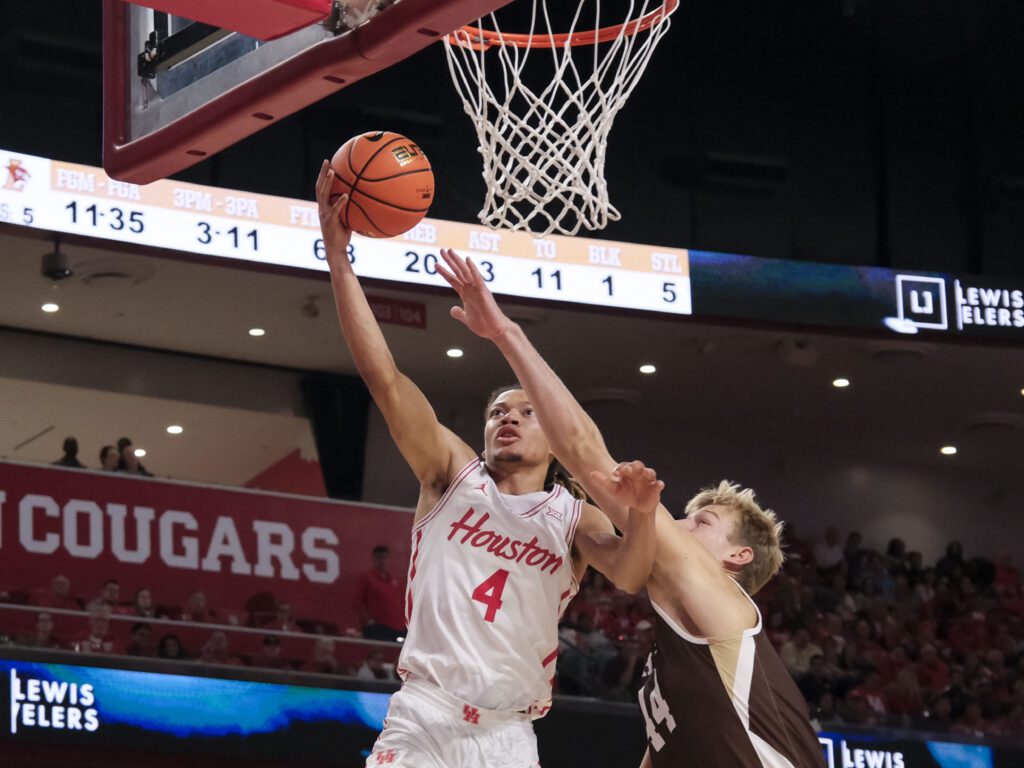 University of Houston freshman point guard Kingston Flemings attacks the rim. (Photo by F. Carter Smith)