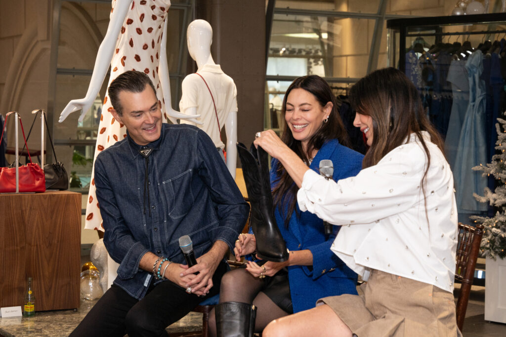Chuck Steelman with the Partlow designers Kasey Lemkin and Lawren Sample during the fashion show.  (Photo by Carol Vig Photography)