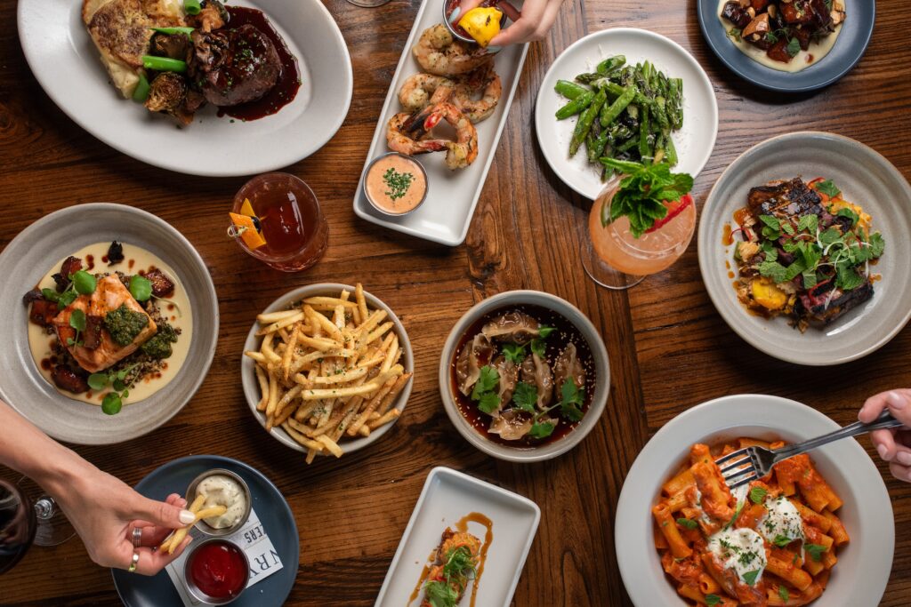 An array of American-style dishes served at the new eatery, The Henry in Memorial's Town & Country center. (Photo by Kathy Tran)