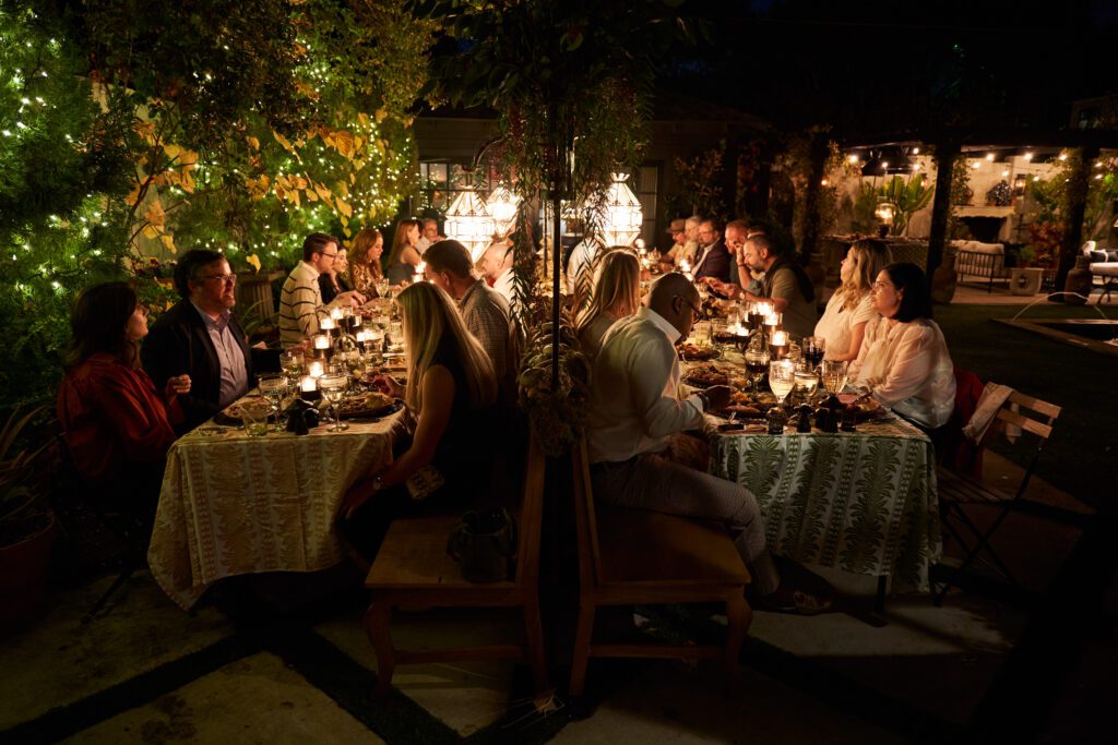 For this year's Friendsgiving, Burkle created a moody, textured tablescape that featured lots of Jan Barboglio pieces, including cast iron mushrooms and six spectacular candelabras that added an enchanting glow to each table.  (Photo by Ethan Good)