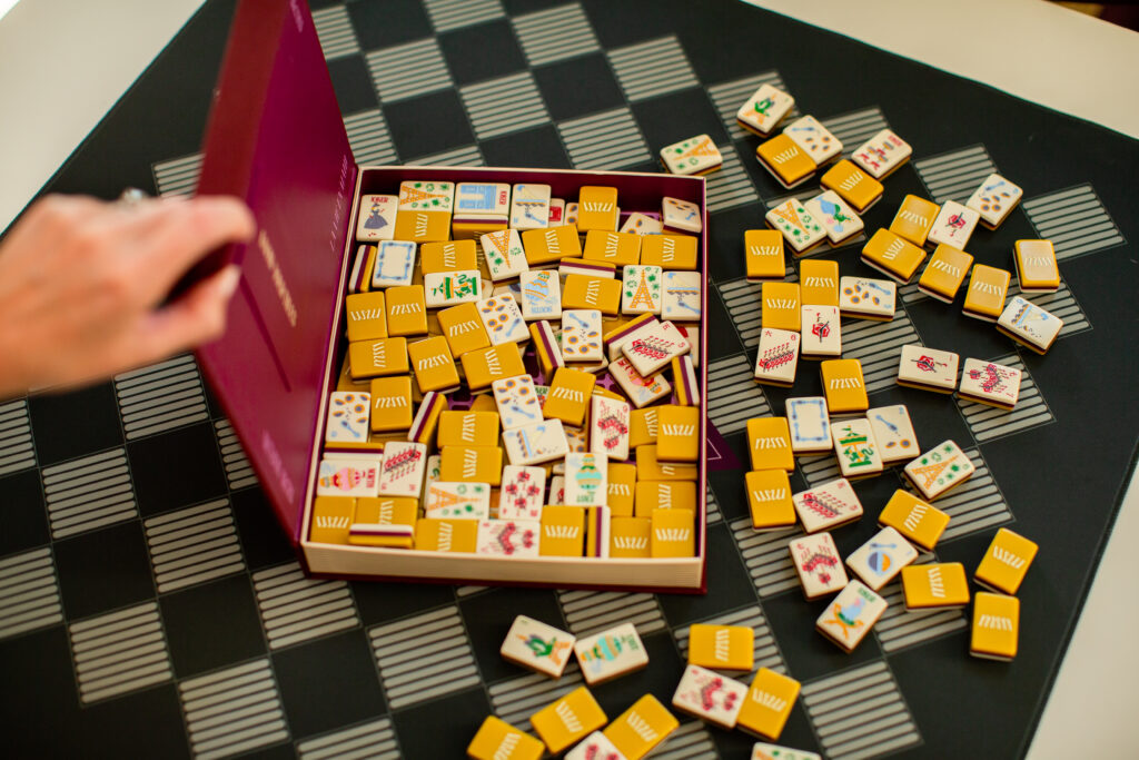 Each Maison Mahj book set holds the complete tile set, custom dice, and a Maison Manual. (Photo by Maison Mahj)