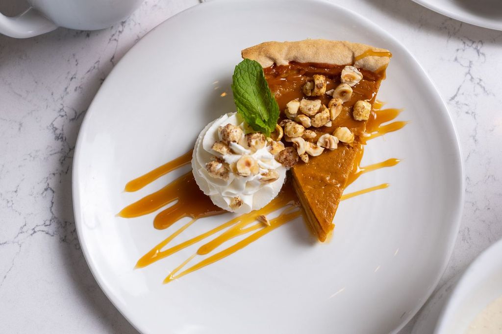No Thanksgiving meal is complete with a slice of delicious pumpkin pie. (Photo by Culinary Khancepts) 
