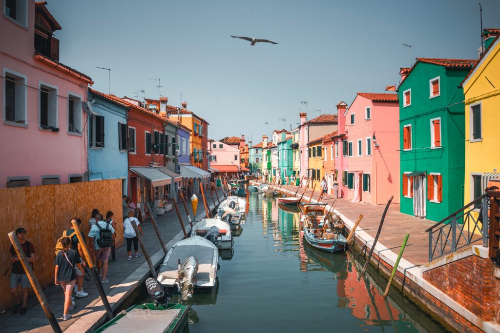 Taking a water taxi to the nearby islands of Venice are a worthy stop to explore the craftsman ship and artisans in the area. 