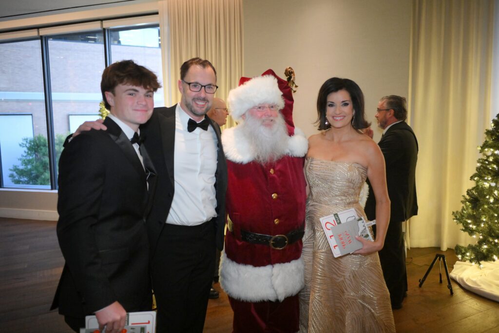 Aiden Thompson, Trees of Hope gala co-chair Joel Thompson, Santa, gala co-chair Lisa Battaglia (Photo by Al Torres Photography)