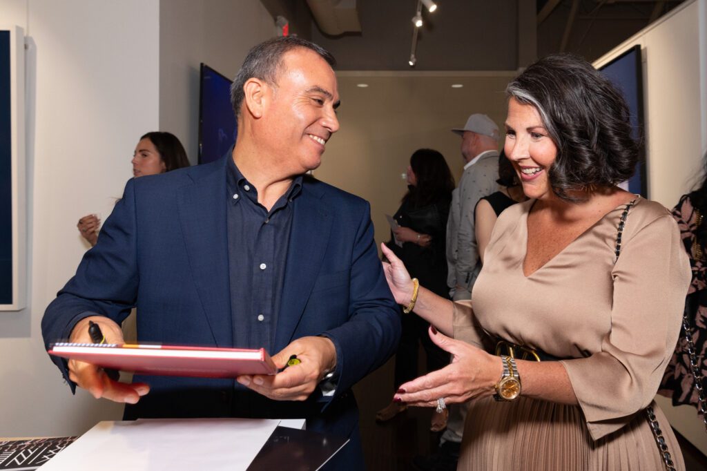 Carlos Vega Faúndez, Heidi Turney at ISHIDA celebration at Art of the World Gallery  (Photo by Paul R. Davis)